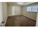 Comfortable bedroom offering neutral walls, carpeting, and a window to bring in light at 2430 Fern Valley Ct, East Point, GA 30344