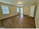 Spacious bedroom with wood floors, light walls, and plenty of natural light at 2430 Fern Valley Ct, East Point, GA 30344