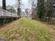 Large backyard with a well-maintained lawn and mature trees at 645 Steve Sw Dr, Atlanta, GA 30315