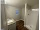 Bathroom featuring a vanity with granite countertop and a shower at 645 Steve Sw Dr, Atlanta, GA 30315