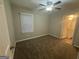 Cozy bedroom with a ceiling fan and window for natural light at 645 Steve Sw Dr, Atlanta, GA 30315
