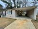 This home features a convenient attached covered carport with a spacious driveway at 645 Steve Sw Dr, Atlanta, GA 30315