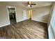 Bright living room with hardwood floors, neutral walls, and a ceiling fan at 836 Amber Nw Pl, Atlanta, GA 30331