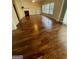Spacious living room featuring a fireplace, and hardwood flooring at 2618 Hooch Ct, Duluth, GA 30097
