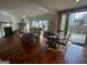 Inviting living area featuring a fireplace, hardwood flooring, and abundant natural light at 2618 Hooch Ct, Duluth, GA 30097