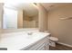 Bathroom featuring a shower-tub combo and a large vanity with a mirror at 430 Birch Se Ln, Conyers, GA 30094