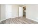 Bedroom with two closets and an entrance to an additional room at 430 Birch Se Ln, Conyers, GA 30094
