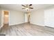 Spacious main bedroom featuring laminate flooring and an ensuite bathroom at 430 Birch Se Ln, Conyers, GA 30094