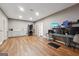 Spacious basement with recessed lighting, wood laminate flooring, desk area, and laundry hookups at 1685 Tabor Dr, Marietta, GA 30062