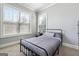 Bedroom with carpet, neutral gray walls, and natural light at 1685 Tabor Dr, Marietta, GA 30062