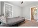 Bedroom featuring carpet flooring, a bed, and bathroom access at 1685 Tabor Dr, Marietta, GA 30062