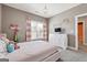 Neutral toned bedroom with natural light and a large dresser at 1685 Tabor Dr, Marietta, GA 30062