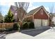 Spacious two-car garage with ample parking and professionally maintained landscaping at 1685 Tabor Dr, Marietta, GA 30062