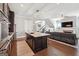 Open kitchen with an island adjacent to the living room creating a spacious and inviting atmosphere at 1685 Tabor Dr, Marietta, GA 30062