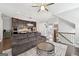 Spacious living room with hardwood floors open to the kitchen and stairs to the upper floor at 1685 Tabor Dr, Marietta, GA 30062