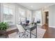 Stylish home office with hardwood floors, modern desk, and plenty of natural light at 1685 Tabor Dr, Marietta, GA 30062