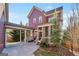 View of the rear exterior with a carport, screened in porch and lush landscaping at 1685 Tabor Dr, Marietta, GA 30062