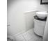 Unique bathroom featuring a white vessel sink on decorative vanity with a dark countertop at 8053 Woodlake Dr, Riverdale, GA 30274