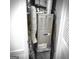 Carrier brand furnace is installed in the closet, providing heating for the home at 8053 Woodlake Dr, Riverdale, GA 30274