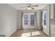 Dining room with hardwood floors, French doors to deck, and abundant natural light at 742 Wilkes Dr, Loganville, GA 30052