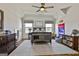 Spacious bedroom featuring vaulted ceilings, two windows, and carpet at 132 Platinum Rdg, Sharpsburg, GA 30277