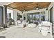 Spacious patio featuring comfortable outdoor seating, a built-in grill, and view of the pool at 132 Platinum Rdg, Sharpsburg, GA 30277