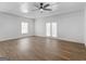 A bright and open living room with wood-look flooring and plenty of space at 321 Pleasant Valley Rd, Mcdonough, GA 30253