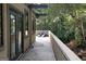 Elegant balcony with a seating area and green trees providing shade at 870 Monroe Ne Dr, Atlanta, GA 30308