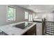 Open floorplan kitchen area, featuring a partial view of the connected bedroom space at 870 Monroe Ne Dr, Atlanta, GA 30308