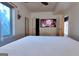 Spacious bedroom featuring sleek furnishings and a cozy entertainment setup at 870 Monroe Ne Dr, Atlanta, GA 30308