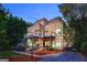 Contemporary home featuring two balconies, modern architectural details and professional landscaping at 870 Monroe Ne Dr, Atlanta, GA 30308