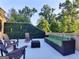 Relaxing patio with sofa, chairs, and decorative greenery offers outdoor enjoyment at 870 Monroe Ne Dr, Atlanta, GA 30308