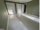 Inviting bedroom with tile flooring, neutral walls, and closet space at 1241 Mount Vernon Dr, Lawrenceville, GA 30044