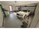 Spacious two car garage with white sports car at 1241 Mount Vernon Dr, Lawrenceville, GA 30044