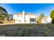 Expansive backyard with a fenced perimeter, mature trees, and a well-maintained lawn at 45 George Wynn Rd, Palmetto, GA 30268