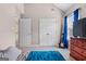 Comfortable carpeted bedroom with ample closet space, neutral paint and a large window at 45 George Wynn Rd, Palmetto, GA 30268