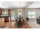 Bright kitchen and breakfast nook area featuring hardwood floors at 45 George Wynn Rd, Palmetto, GA 30268