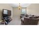 Cozy living room featuring soft lighting, plush seating, and entertainment setup at 45 George Wynn Rd, Palmetto, GA 30268