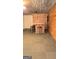 Basement bar area with wood ceiling and wood walls at 35 Abelia Dr, Covington, GA 30014