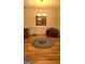 Elegant dining room with a chandelier, wainscoting, and hardwood floors at 35 Abelia Dr, Covington, GA 30014
