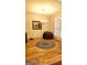 Dining room with a bean bag chair, wooden floor and plantation shutters at 35 Abelia Dr, Covington, GA 30014
