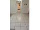 Tile hallway with doorways leading to other rooms at 35 Abelia Dr, Covington, GA 30014