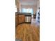 Open kitchen featuring wooden cabinets and stainless steel appliances at 35 Abelia Dr, Covington, GA 30014