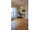 Bright home office with a desk, chair, and large window with a view at 35 Abelia Dr, Covington, GA 30014