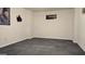 Neutral room with gray carpeting and a 'Covington Ga' wall decor at 35 Abelia Dr, Covington, GA 30014