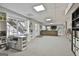 Spacious finished basement featuring an office area, neutral carpet, and ample storage space at 44 Willow Leaf Way, Sharpsburg, GA 30277