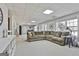 Spacious finished basement featuring cozy seating, bright lighting and ample storage at 44 Willow Leaf Way, Sharpsburg, GA 30277