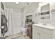 Clean bathroom featuring a shower-tub combo and an updated vanity and fixtures at 44 Willow Leaf Way, Sharpsburg, GA 30277