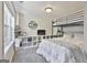 Cozy bedroom featuring a bunk bed, a mirror and a large window with natural light at 44 Willow Leaf Way, Sharpsburg, GA 30277