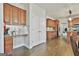 Butler's pantry featuring custom cabinets, countertops, a sink, and a convenient layout at 44 Willow Leaf Way, Sharpsburg, GA 30277